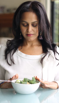 Dr. Shivani Gupta enjoying a nourishing Ayurvedic meal.