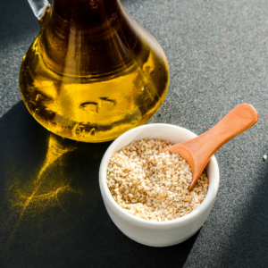 Sesame oil and seeds used in Ayurvedic face washing rituals.