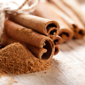 Fresh ginger and cinnamon sticks for digestive and metabolic health.