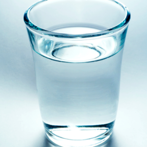 Neti Pot nasal cleansing using purified water for sinus health.