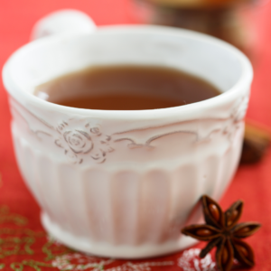 Ayurvedic herbal tea served with anise and ginger.