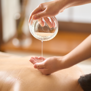 Stimulate circulation and balance Kapha energy with a warm sesame oil massage.