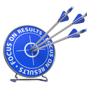 A blue target with arrows hitting the bullseye, symbolizing goal-driven focus and perfectionism of Pitta dosha.