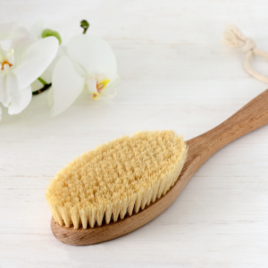 Dry brushing and cold showers to stimulate circulation and balance Kapha energy