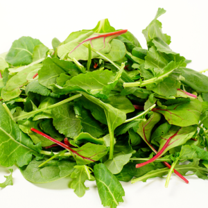 Fresh greens and herbs for the Seasonal eating Ayurveda guide.