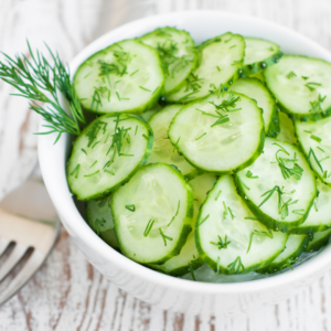 Cucumber slices paired with herbs in food combinations Ayurveda for digestion to cool the digestive system and support hydration