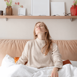 Woman relaxing, taking deep breaths.
