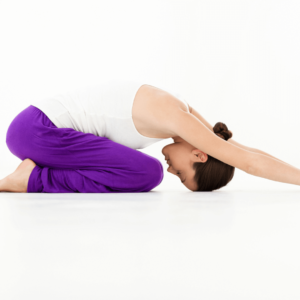 Child's pose, a restorative yoga practice, enhances Ayurvedic sleep and calms inflammation.
