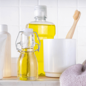 Natural Ayurvedic oil for oral hygiene and oil pulling routine.