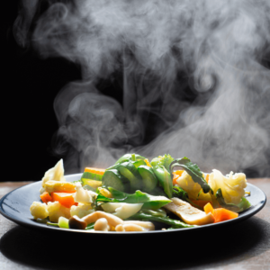 Steamed vegetables on a plate, an easy-to-digest Ayurvedic meal