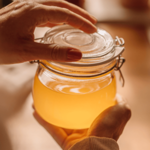 Golden Ayurvedic ghee ready to be added to meals for digestion and brain health